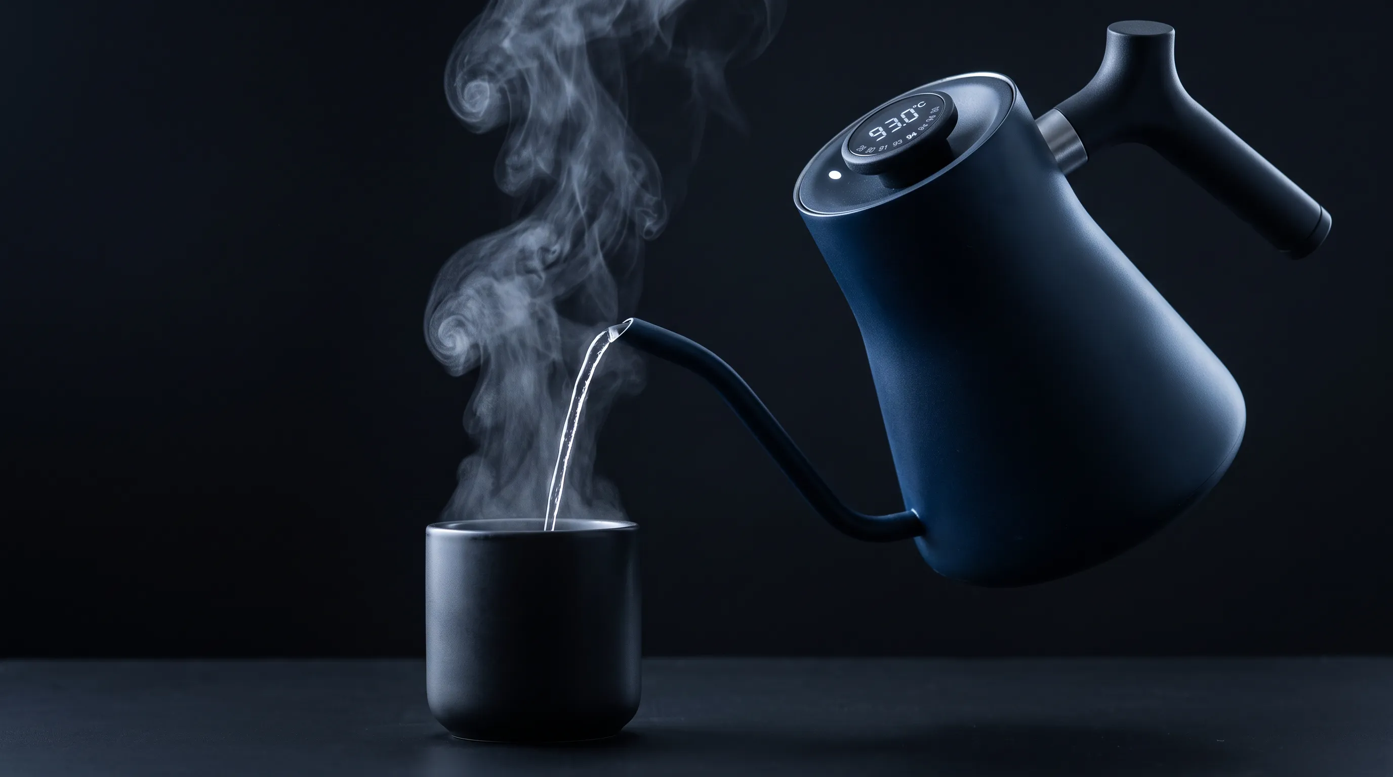 Matte black gooseneck electric kettle pouring hot water into a pour-over coffee dripper